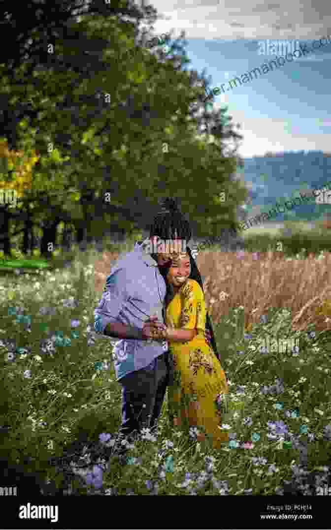 A Couple Embracing In A Field, Surrounded By Wildflowers The Orphan Thief: A Heartbreaking Historical Romance From The USA Today Author Of The Secret Orphan