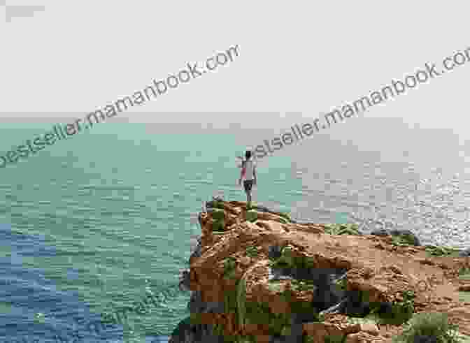 Image Of A Person Standing On A Cliff Overlooking The Ocean The New Retirement: The Ultimate Guide To The Rest Of Your Life